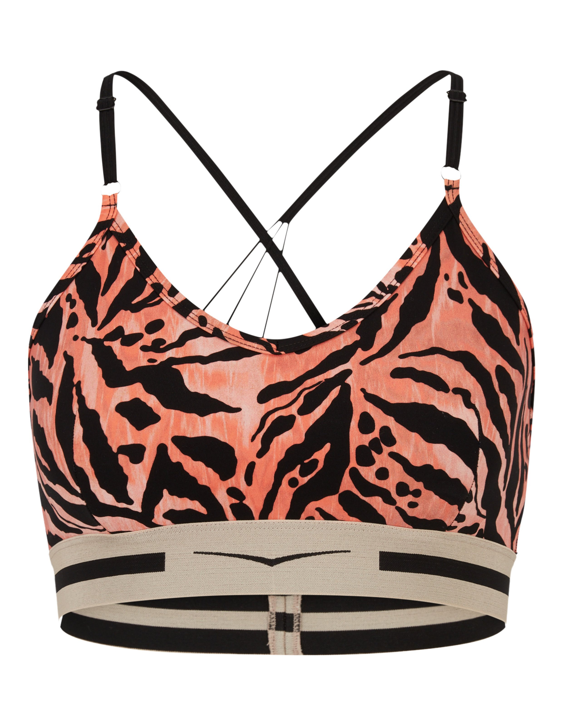 Ein korallenfarbener Sport-BH mit schwarzem Zebramuster, kreuzenden Trägern und einem gestreiften Bund.